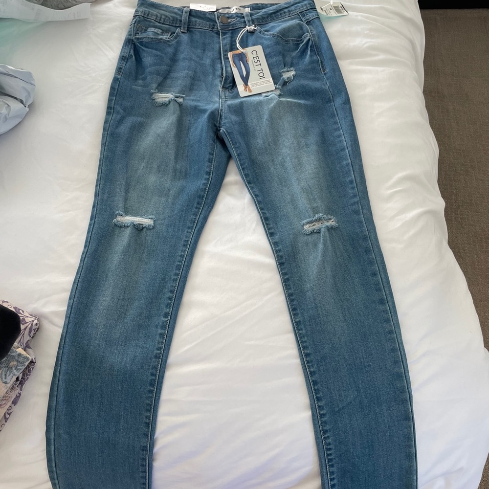 Brand new ripped jeans Size 9